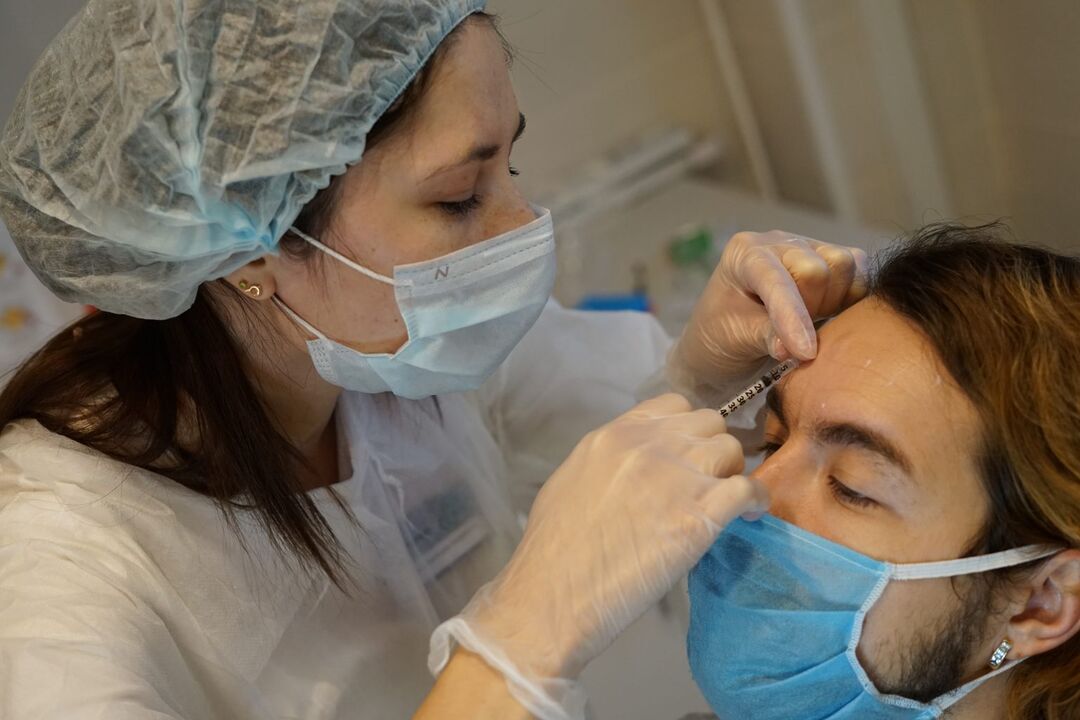 Botulinum therapy - injection procedure to rejuvenate facial skin
